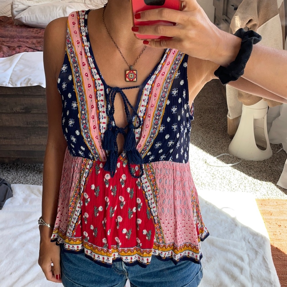 SOLD Boho patterned patchwork shirt. Shirtsleeve with two ties in the front.